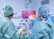 67130630 - surgeons performing surgery in operating theater.